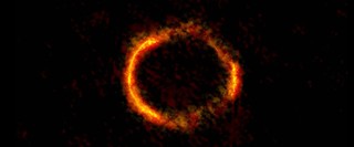 Gravity bends light of distant galaxy into a ring 